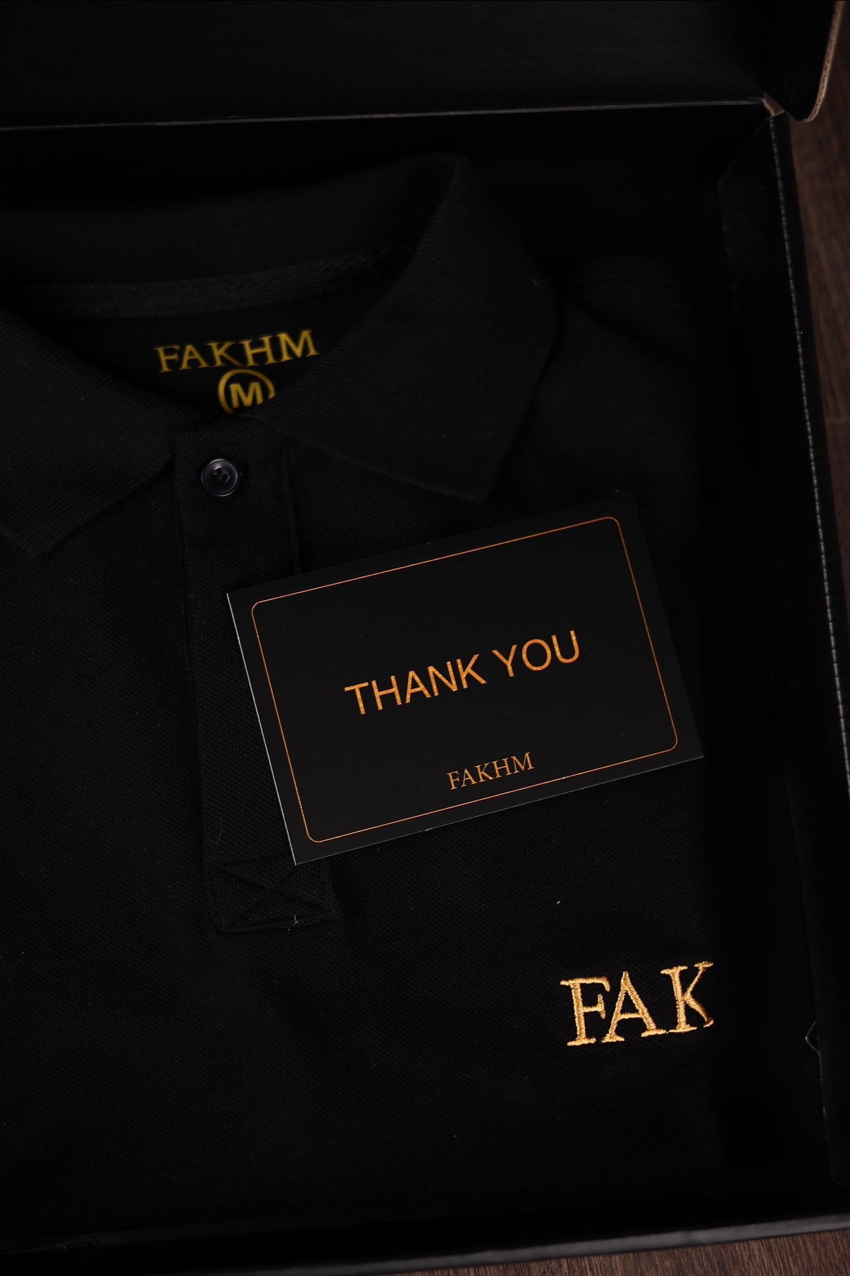 FAKHM Prestige Polo – Black / Gold Embroidery